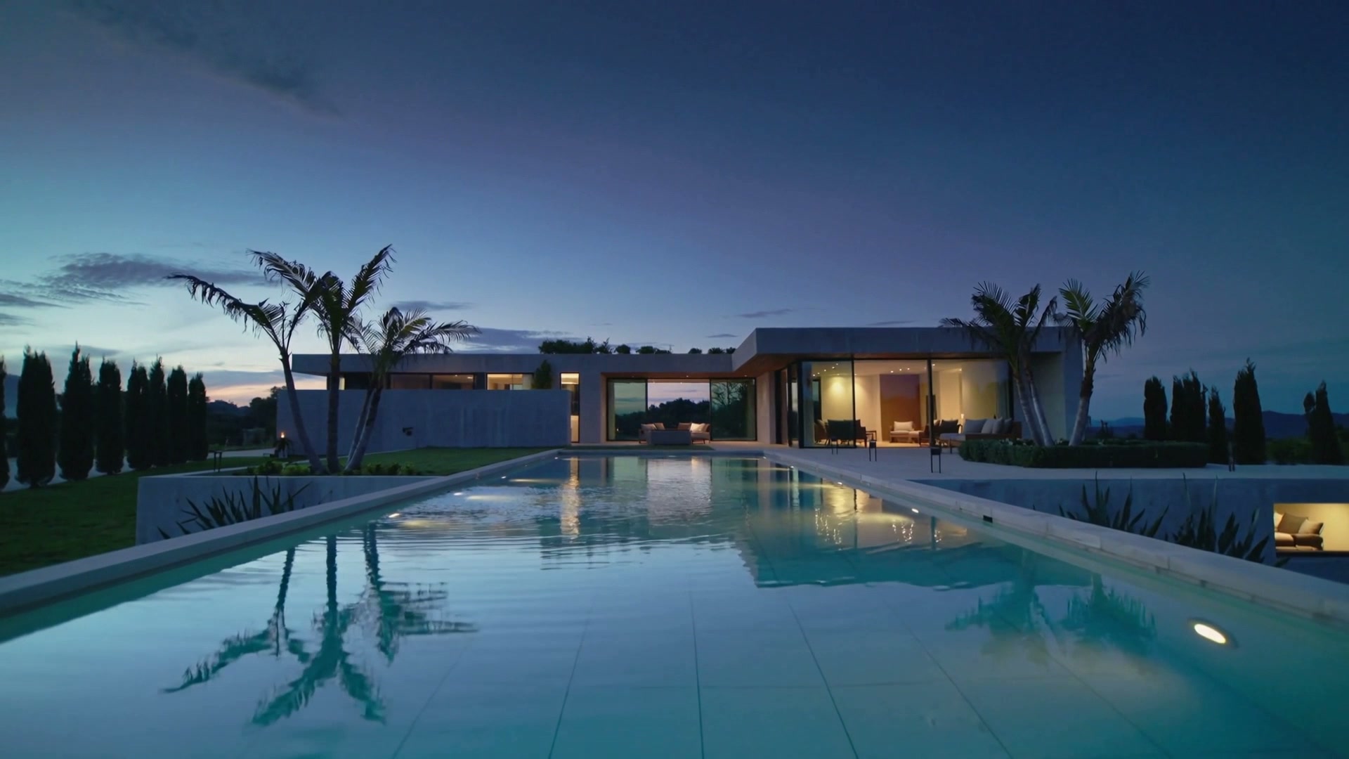 A modern luxury home at twilight